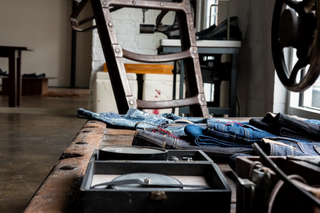 Shockoe Atelier storefront with old and new denim.