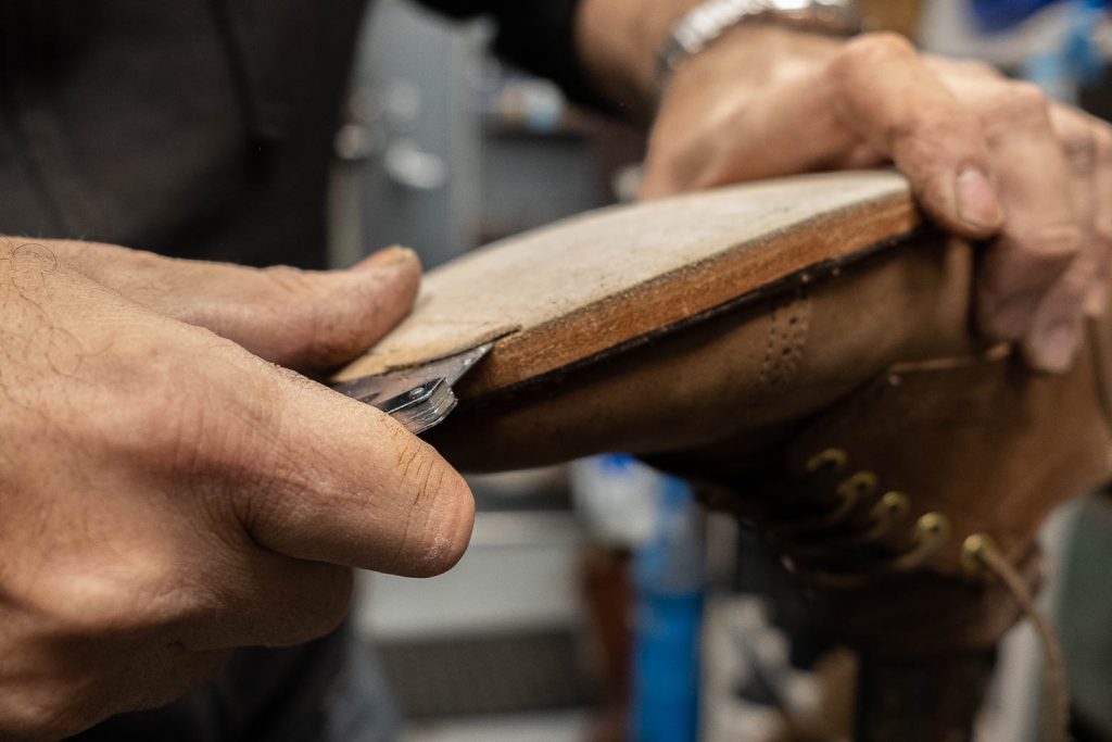 cutting through a thin layer of the outer sole