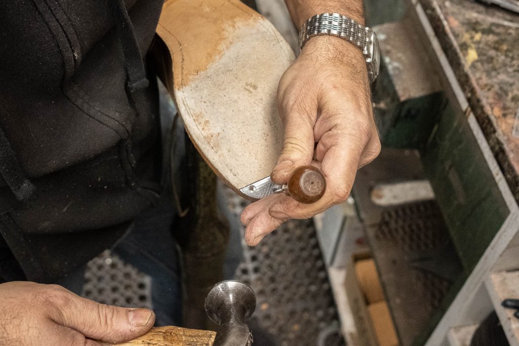 creating pilot holes to drill in screws for the toe taps