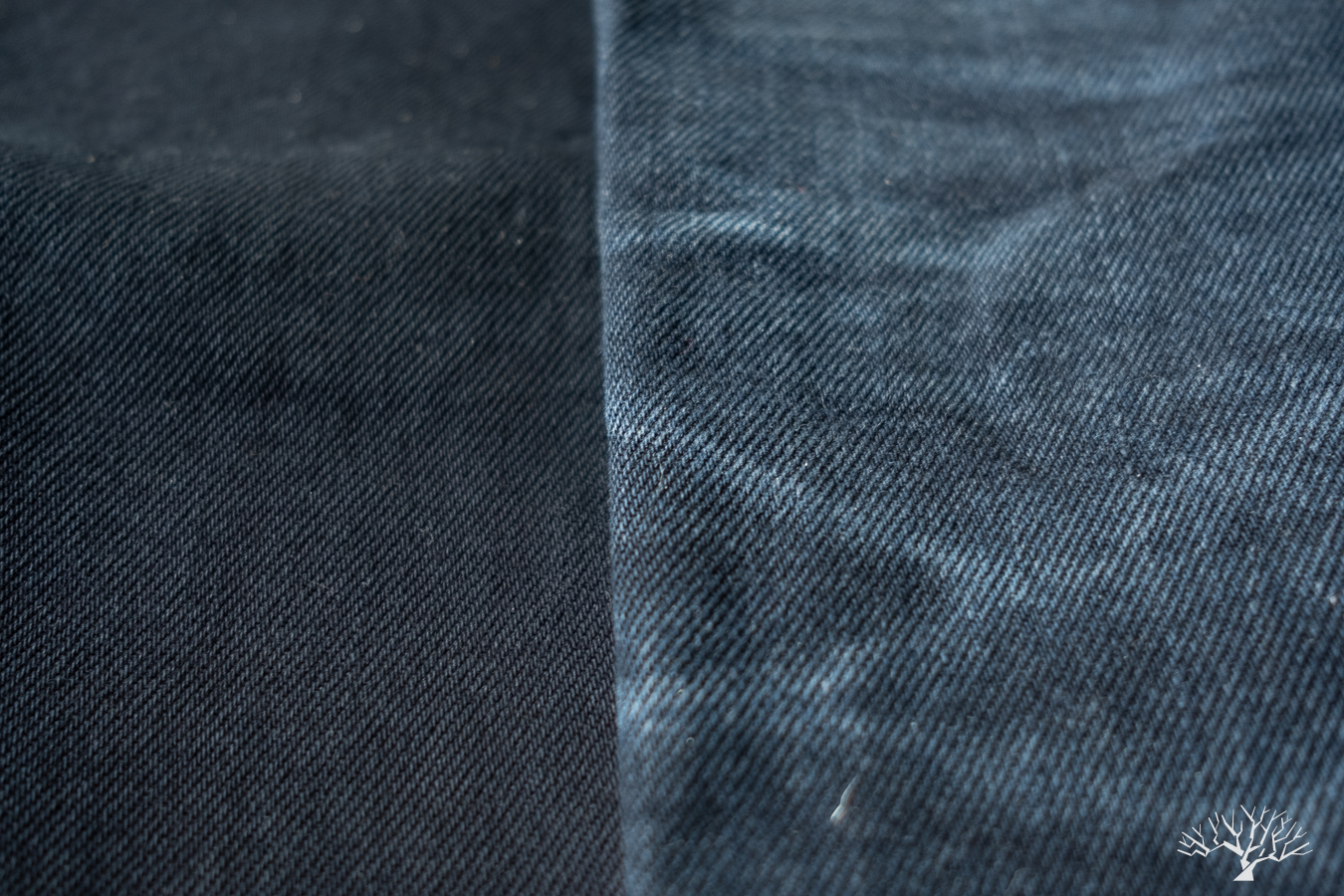 Iron Heart 21oz overdyed black selvedge denim pair compared to a brand new pair, honeycombs around the back of knees